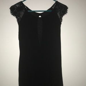 Black top with lace cap sleeves